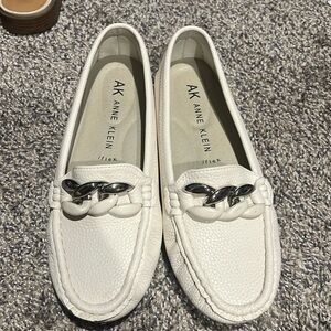 White flat shoes
